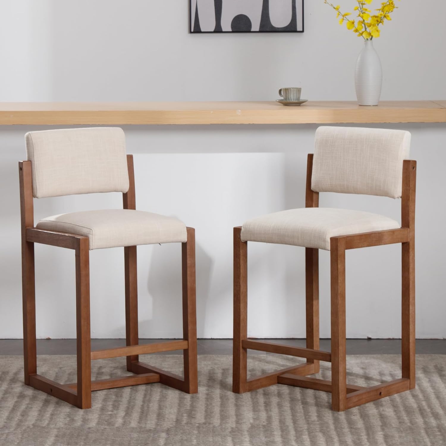 The frame is made of solid wood and is very sturdy. The chairs look really beautiful too and they are reasonably comfortable to sit on. It could be a little demanding to assemble a pair at the same time though (if you have a power screwdriver make sure to use it).