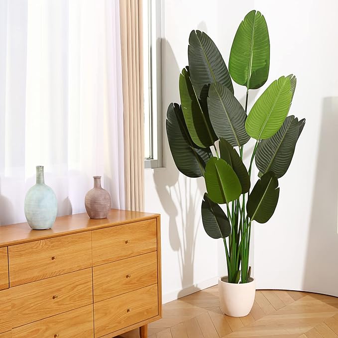 *THIS IS AN HONEST REVIEW- I wasnt paid or compensated in any way for my review.*I love this birds of paradise artificial plant. I live in an old Victorian house with high ceilings and the 6 ft size fits nicely. I am in the process of redoing my bedroom as I cant stand the gray/silver/white color scheme anymore (yuck). Anyways, for months I was trying to figure out what to put in this empty corner of my bedroom. I looked at many birds of paradise plants but ultimately decided on this one and i