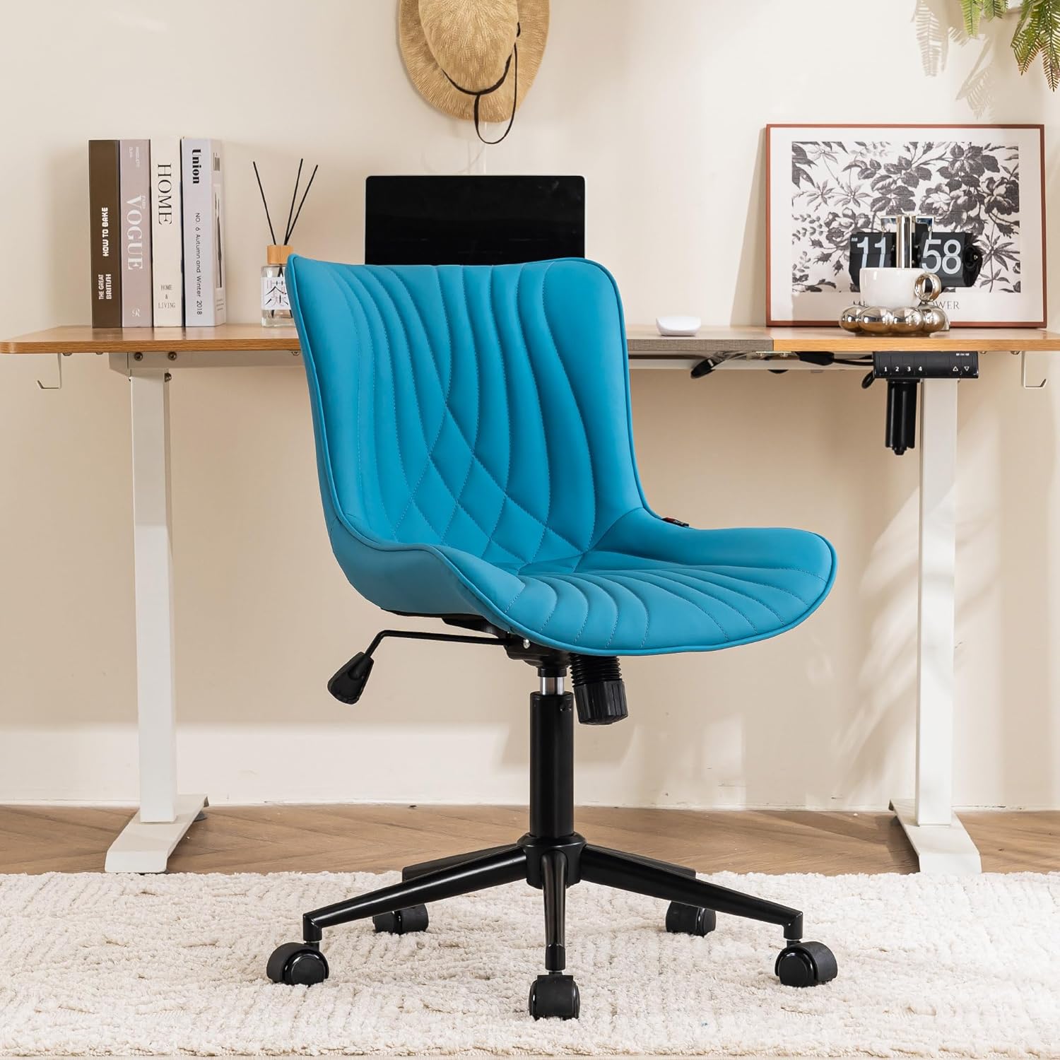 I love this comfortable and stylish chair! It fits perfect in my little office nook in my kitchen. The chair has a modern look with beautiful stitching and it was easy to assemble