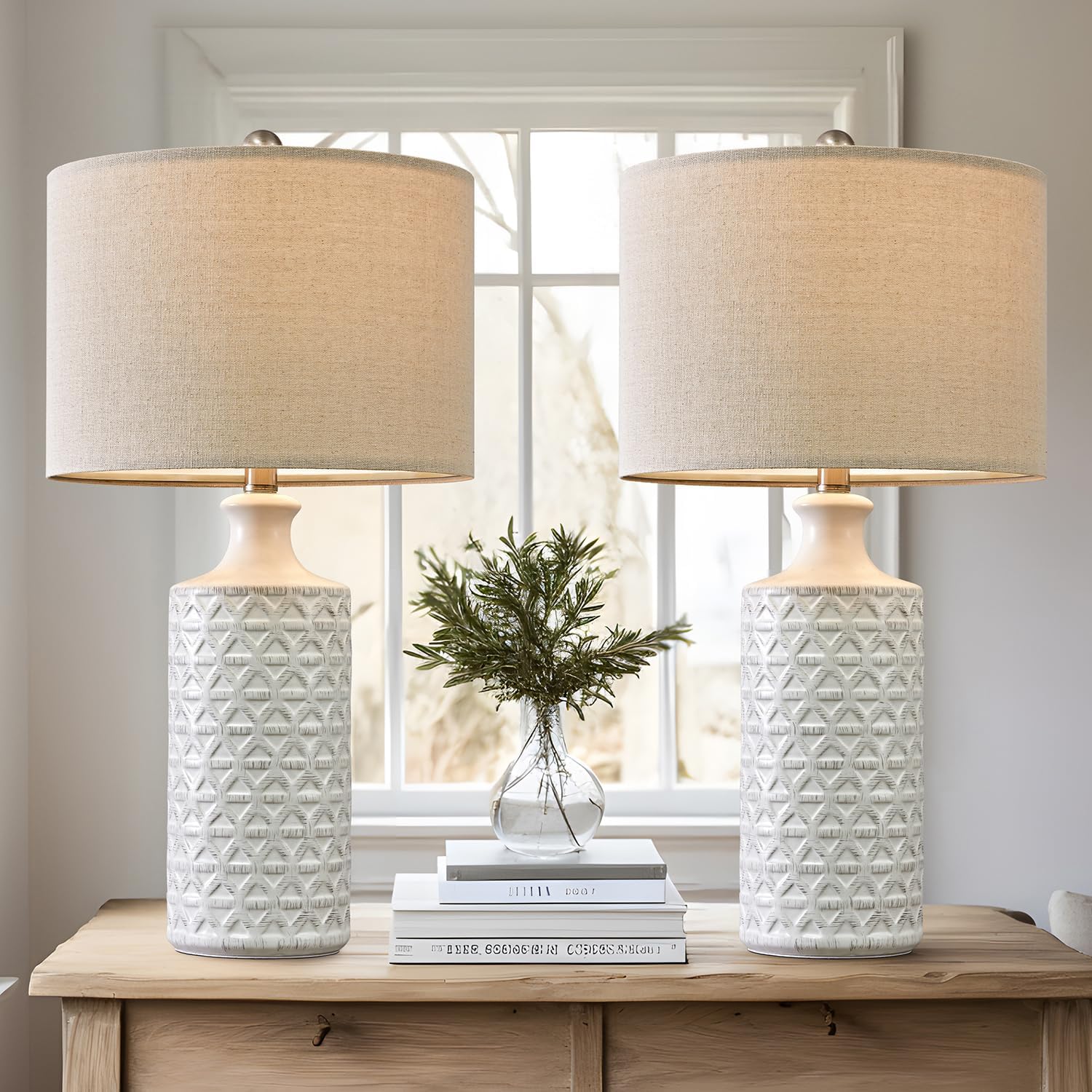 I am very pleased with this purchase. They were very easy to assemble. And look very pretty in my space. The lamps are an ivory color with a greige color on the diamonds.