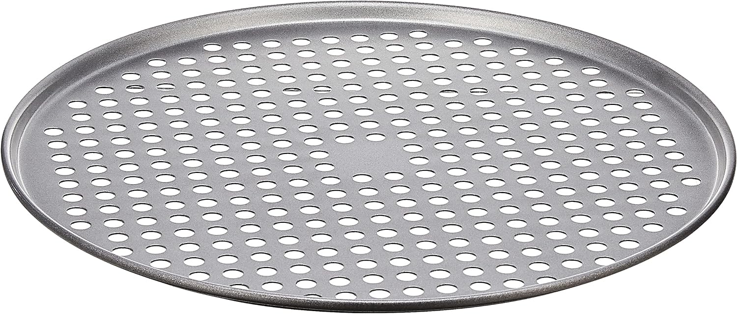 The Cuisinart 14-Inch Pizza Pan has become an essential tool in my kitchen, delivering exceptional results and making pizza baking a breeze. This Chef' Classic Nonstick Bakeware is a standout choice for its superior quality, reliable performance, and easy-to-clean design.First and foremost, the 14-inch size is perfect for baking family-sized pizzas, ensuring everyone gets to enjoy a delicious slice. The generous surface area allows for even cooking and crispy crusts, creating a delightful pizza