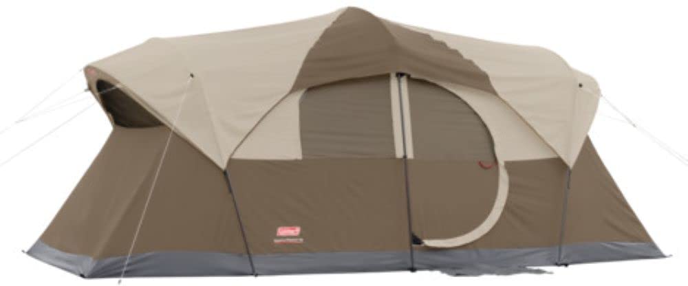 Well this is my initial review. I plan to come back and do another review after we have used it more than once.First off photo 1 shown on amazon is the front of the tent. The door shown in this first photo is the front door that is hinged. The second photo is of the backside of the same tent but the back door is just zippered. Photo 2 also shows the little diagonal light color tent material close to the bottom on the left that conceals the little zipper to allow cords to run in and out of the te