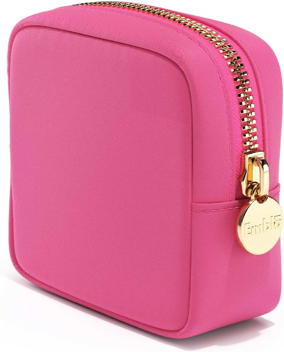 Such a cute and functional little bag! Its perfect for lipsticks/gloss and a compact. The zipper is so smooth and durable. Fits right in my purse with my wallet. Definitely recommend!
