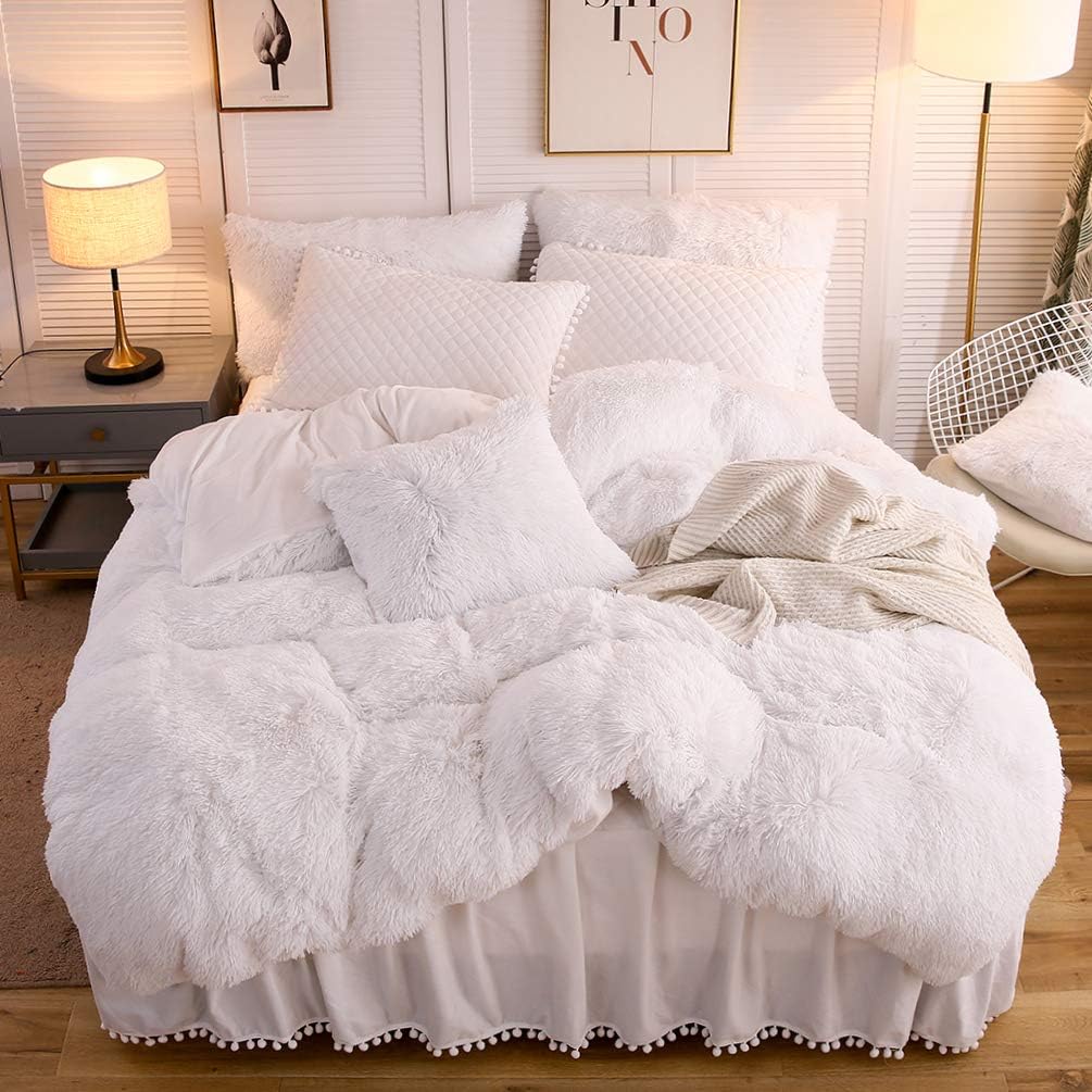 This did live up to the hype! It is soft. It is fluffy and warm. I prefer cotton on my bed but this is for the RV and it is in addition to the flannel bedding so we love it. The pillow shams were actually the BEST! Very soft with cute little pompoms!