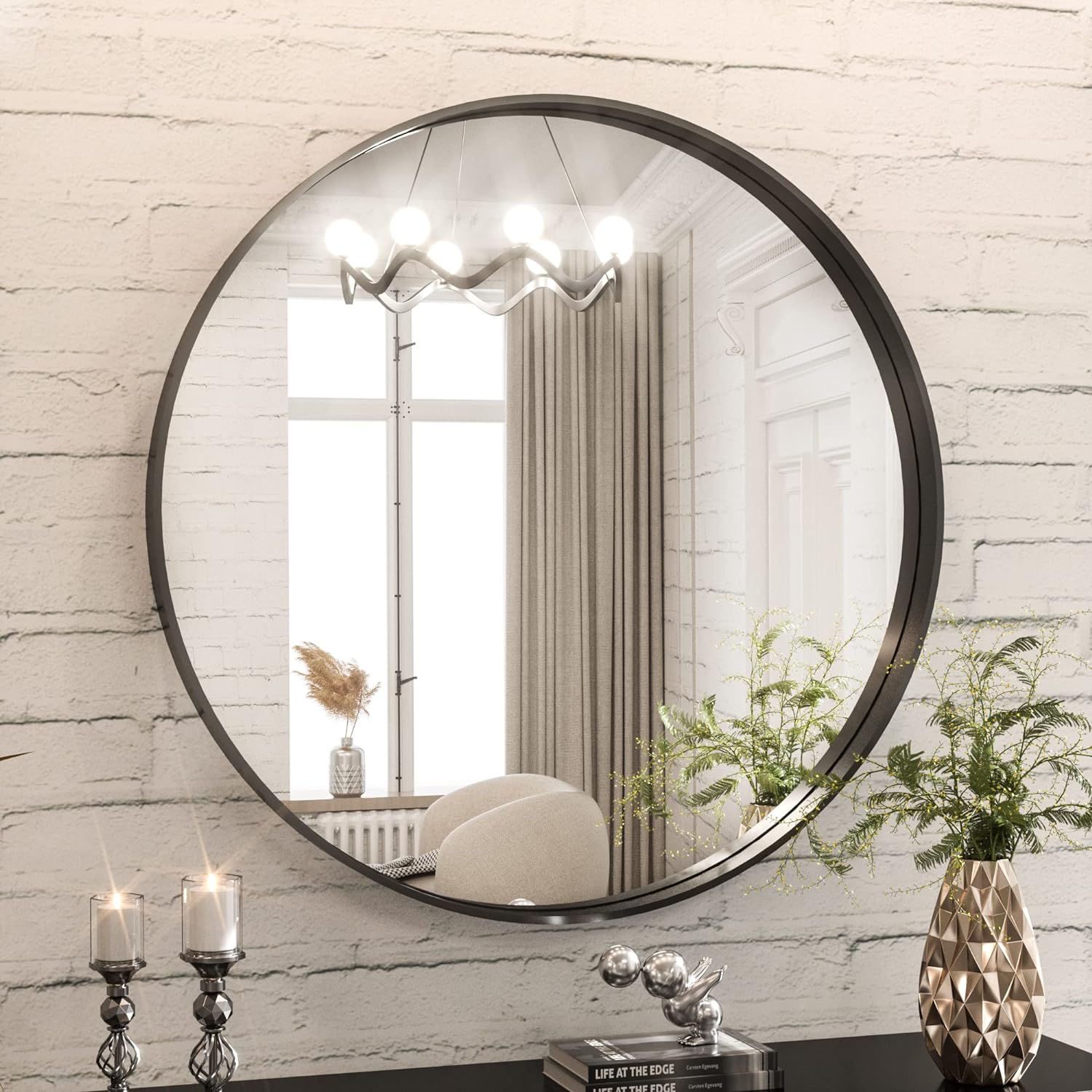 I liked this mirror over my daughter' vanity desk so much that we bought a huge one in the same finish but in a different shape for a powder bath. Both mirrors are clear and distortion-free. Both arrived intact and the frame is a soft, brushed gold but not too yellow - it' a classy finish and they both look a lot more expensive than they were. They made this very easy to hang.