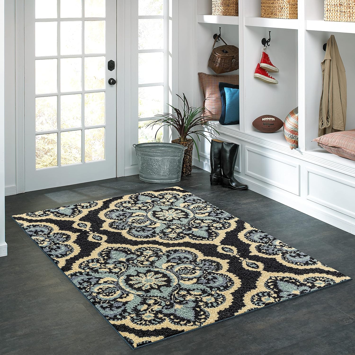 I bought many of the Maples Vivian Medallion pattern in grey. I have special needs pets and a child so I needed a rug that was practical, affordable, soft for people, but also super easy to clean. I detest carpet cleaning machines and really wanted something I could clean without that.I doubt the listing says to put them in the washing machine BUT I DO! They even lived through being put in the dryer on high, which I never do but my helpful other half did in an effort to help with laundry. I wa